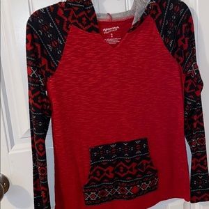 Long sleeve shirt with hood.